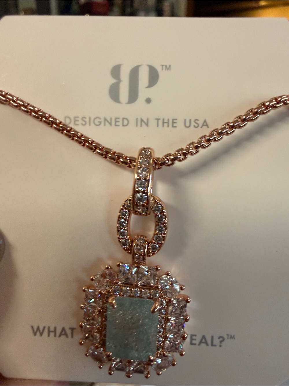 bp Rose Gold Chain Necklace with Aquamarine Center and Crystal Halo